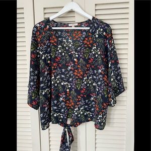 Batwing sleeve blouse.